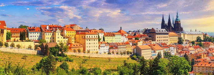  Summer cityscape, panorama, banner - view of the Hradcany historical district of Prague and castle complex Prague Castle, Czech Republic © rustamank
