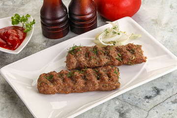 Kebab with beef served onion