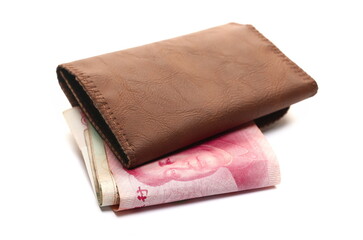 Brown leather wallet with various yuan bills, renminbi banknotes, cash money isolated on white, clipping 