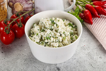 Curd cheese with green herbs