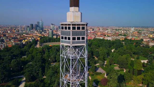 Aerial view of the branca tower summer trees in the sempione park, castello sforzesco. Triennale Milano Design Museum. View of modern skyscrapers. Ecology. Green Planet. Milan Italy 10.2023