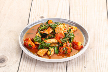 Chicken with tomato and spinach