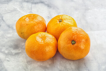 Fresh ripe juicy yellow mandarin