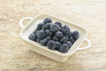 Sweet ripe blueberry heap in the bowl