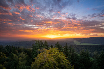 Fototapeta na wymiar Colourful sunrise over the northern Black Forest in late summer