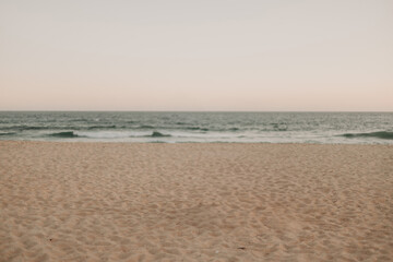 Fototapeta premium Beautiful Grumari RJ beach with greenish emerald waters and yellow sands