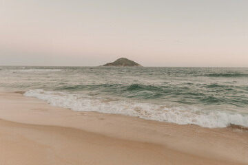 Fototapeta na wymiar Beautiful Grumari RJ beach with greenish emerald waters and yellow sands