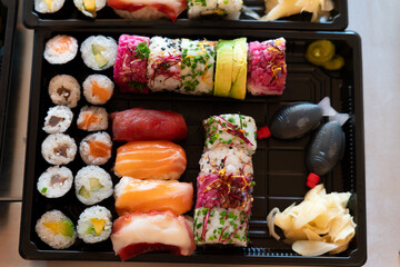 nigiri and sushi rolls tray to take away