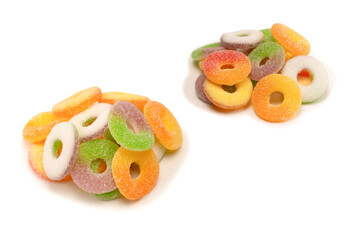 Assorted gummy candies isolated on a white background. Top view.