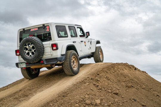 Loveland, CO, USA - August 25, 2023: Jeep Wrangler, Rubicon model, on a training drive off-road course
