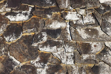 Texture of a stone wall. Old castle stone wall texture background. Stone wall as a background or texture. Part of a stone wall, for background or texture