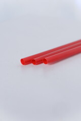 red straw with a white background