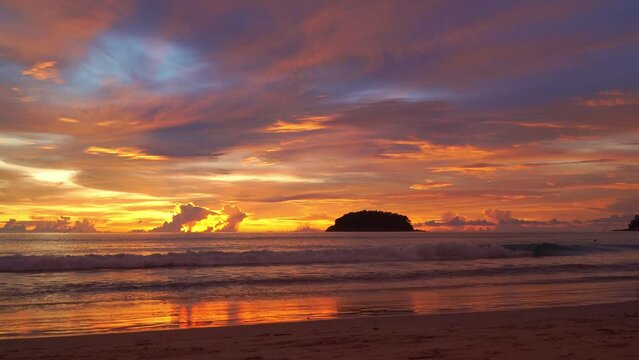 .Exotic colorful sky in bright red sunset at Kata beach Phuket..Scene of colorful romantic sky of sunset. Gradient color. Sky texture..amazing sky of bright sunset in nature and travel concept..