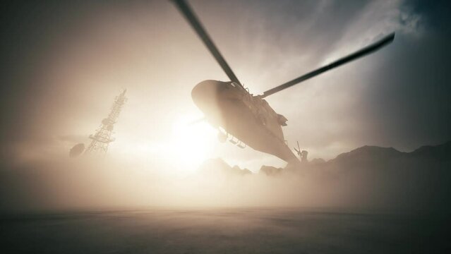 A military helicopter lands at a military base. Army helicopter preparing to land. Military helicopter, slow motion, close up