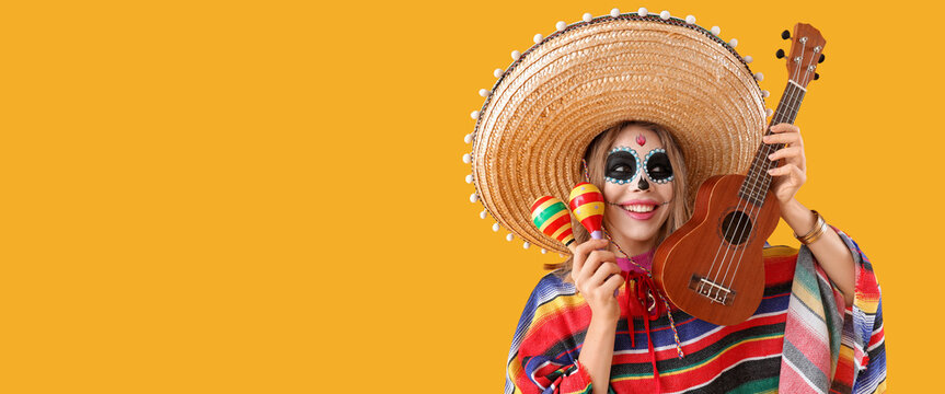 Young woman with painted face, maracas and guitar on yellow background with space for text. Mexico's Day of the Dead (El Dia de Muertos)