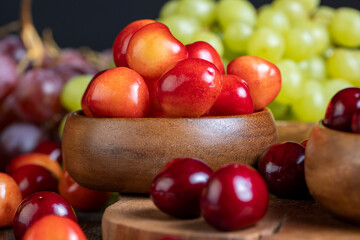 Sweet fresh cherries with other products