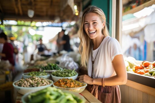 A traveler savoring a local delicacy at a bustling countryside market