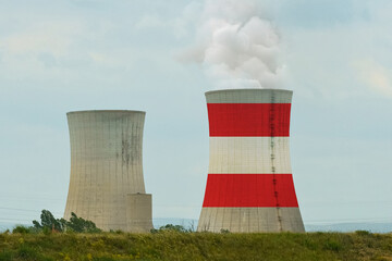 The flag of Austria is depicted on the cooling tower of the nuclear power plant