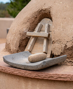 Close-up of Grinding Stone with Trough-shaped Metates and Horno Oven
