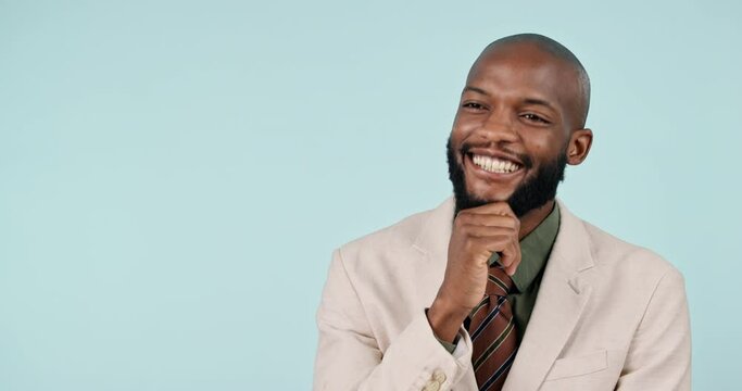 Thinking, idea and happy black man in studio with questions, solution and strategy on blue background. Why, smile and African male model with aha emoji for problem solving, conclusion or answer