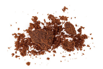 Dark muscovado sugar or Barbados sugar isolated on white background. Top view. Flat lay