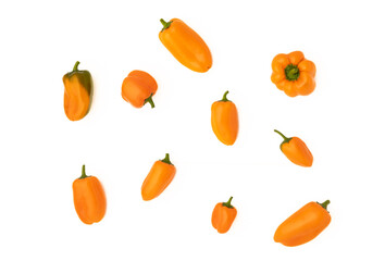 Set of yellow peppers isolated on white