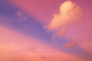 Naklejka na ściany i meble Dramatic sunset, pink violet sky with ray. 