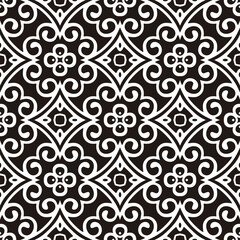 Seamless pattern with folk motifs in black and white