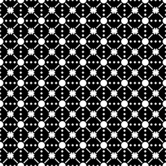 Seamless pattern with dots and flowers in black and white
