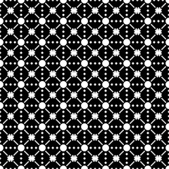 Seamless pattern with dots and flowers in black and white
