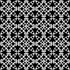Seamless pattern with ethnic motifs in black and white