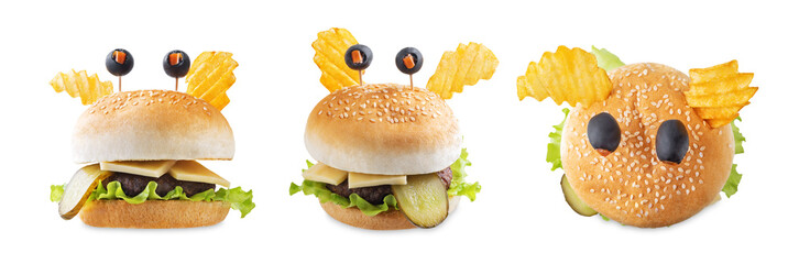 Meat burger in the form of funny monster for Halloween holiday on a white isolated background - obrazy, fototapety, plakaty
