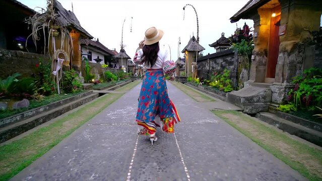Tourist walking at Penglipuran village is a traditional oldest Bali village in Bali, Indonesia.