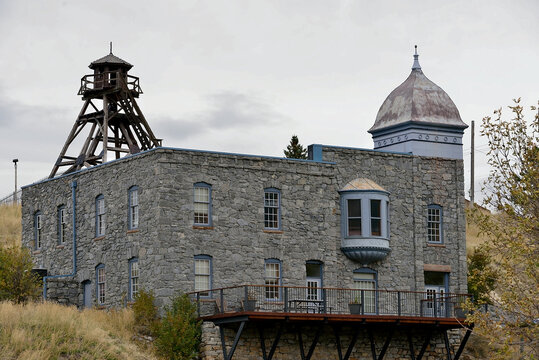 Two historic buildings in Helena Montana USA. Wooden FIRE TOWER, built in 1879; 25ft tall; in use 'til 1931 with 24-7 manning. BLUESTONE HOUSE, built in 1889, 1935 earthquake damage, restored in 1974.