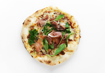 Prosciutto pizza with mozzarella cheese, prosciutto, dried basil, arugula isolated on white background. Pizza top view.