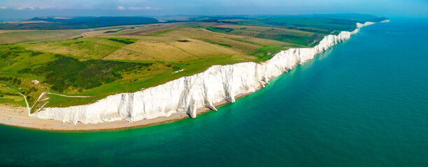 An aerial drone view of the Seven Sisters cliffs on the East Sussex coast, UK - obrazy, fototapety, plakaty