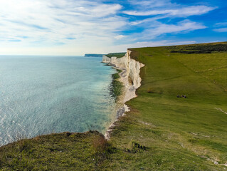 An aerial drone view of the Seven Sisters cliffs on the East Sussex coast, UK