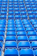 Naklejka premium Chairs on the podium of the stadium as a background.