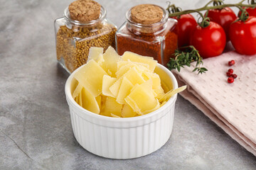 Sliced parmesan cheese in the bowl
