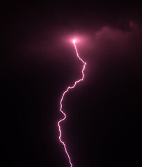 Lightning bolt over night sky