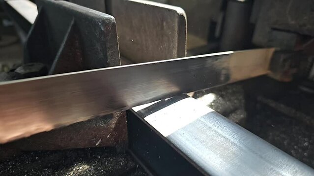 metal saw with sawdust slow motion