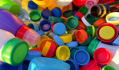 Recycling Plastic Bottle Caps. Plastic Material is Recyclable. Remove Lids from Plastic Bottles before Recycling. Plastic Waste Collection for Recycling. Drink Bottle caps to conversion and Reuse.