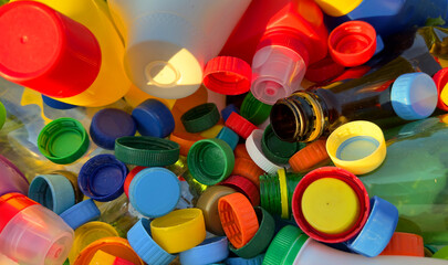 Recycling Plastic Bottle Caps. Plastic Material is Recyclable. Remove Lids from Plastic Bottles before Recycling. Plastic Waste Collection for Recycling. Drink Bottle caps to conversion and Reuse.
