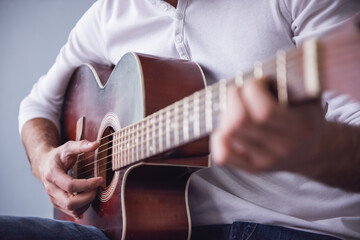 Fototapeta na wymiar Handsome man with guitar