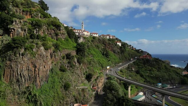 Beautiful aerial footage in Penha d'Águia rocks and local villages area one of Madeira's most outstanding geological symbols
