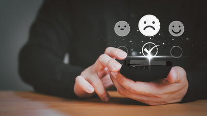 Business service concept of customer experience dissatisfied. Customer give the feedback with angry emotion face on virtual screen. Assessment testimonial review for dislike service and low quality. - 647457742