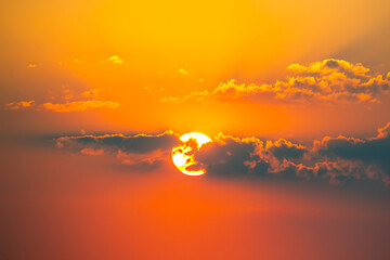 Fototapeta premium Colorful clouds in the sky at sunset. Landscape in nature. Bright and juicy evening colored sky