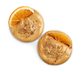 Glasses of delicious dalgona coffee with dry orange and chocolate isolated on white, top view