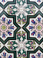 Traditional white, green and pink ornate portuguese decorative tiles azulejos