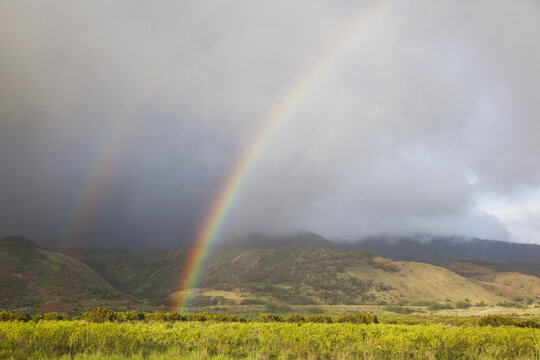 A Dramatic Rainbow On Mt. Lanai Hale; Lanai, Hawaii, United States Of America